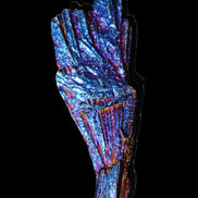 Titanium electroplated Tourmaline feather crystal 12-15g in sunlight - Rocks and Things Store