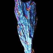 Titanium electroplated Tourmaline feather crystal 12-15g in sunlight - Rocks and Things Store