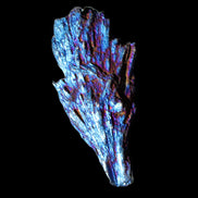 Titanium electroplated Tourmaline feather crystal 12-15g in sunlight - Rocks and Things Store