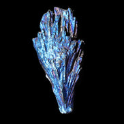 Titanium electroplated Tourmaline feather crystal 12-15g in sunlight - Rocks and Things Store