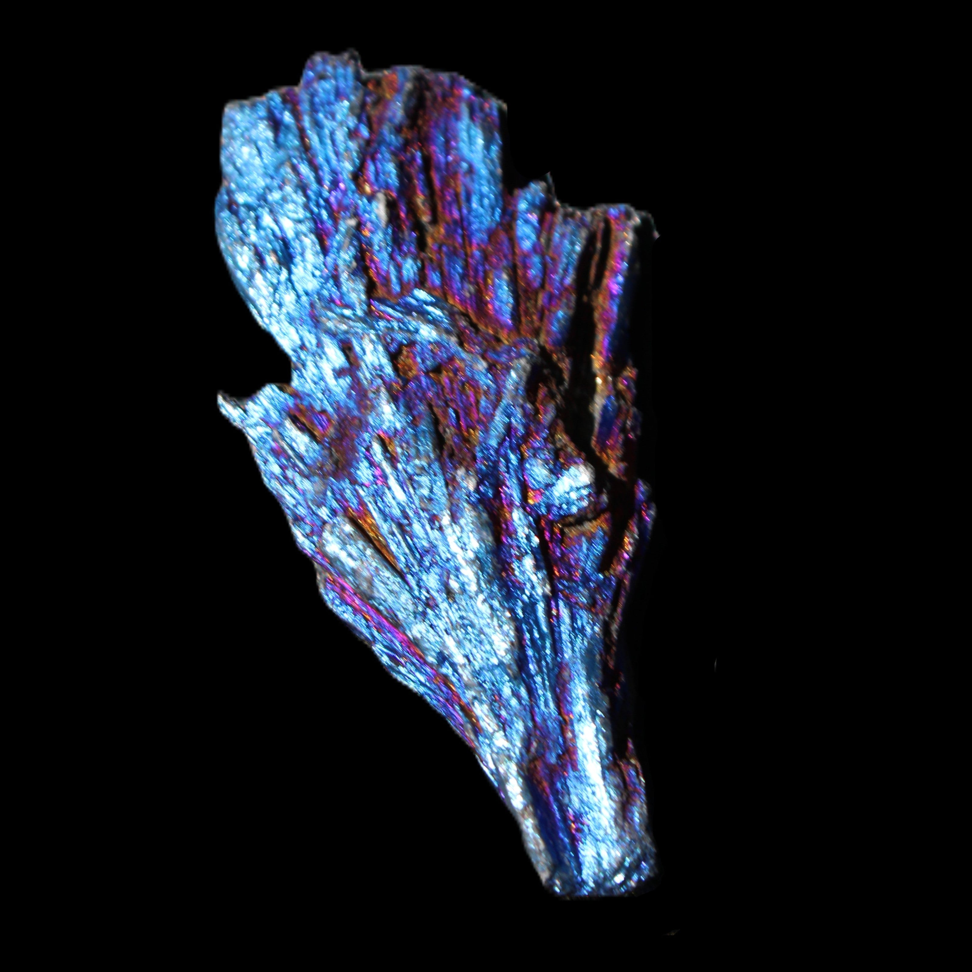 Titanium electroplated Tourmaline feather crystal 12-15g in sunlight - Rocks and Things Store