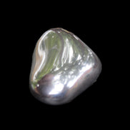 Hematite Terahertz stone 32*22*10mm 25.8g in sunlight - Rocks and Things Store
