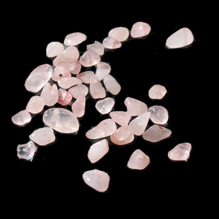 Rose Quartz 40 tiny drilled beads in bright sunlight - Rocks and Things Store