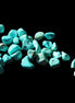 Turquoise 28 tiny drilled beads in bright sunlight - Rocks and Things Store