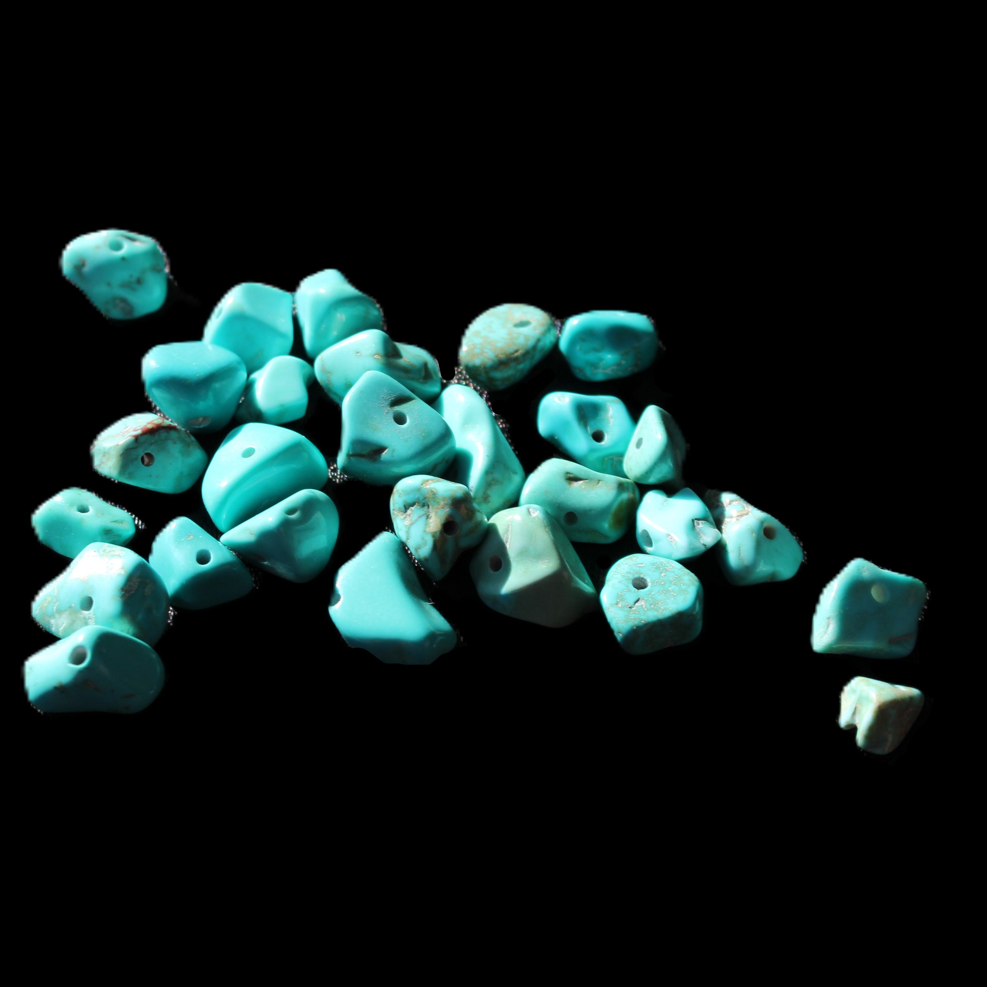 Turquoise 28 tiny drilled beads in bright sunlight - Rocks and Things Store
