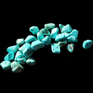 Turquoise 28 tiny drilled beads in bright sunlight - Rocks and Things Store