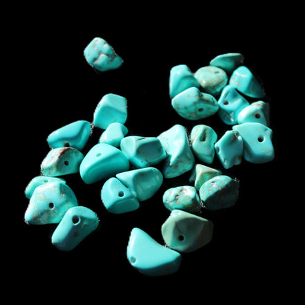 Turquoise 28 tiny drilled beads in bright sunlight - Rocks and Things Store