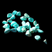 Turquoise 28 tiny drilled beads in bright sunlight - Rocks and Things Store