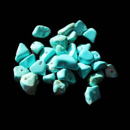 Turquoise 28 tiny drilled beads in bright sunlight - Rocks and Things Store