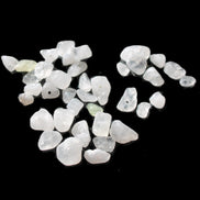 Clear Quartz 35 tiny drilled beads in bright sunlight - Rocks and Things Store