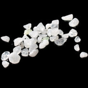 Clear Quartz 35 tiny drilled beads in bright sunlight - Rocks and Things Store