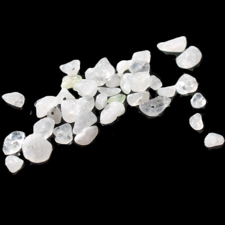 Clear Quartz 35 tiny drilled beads in bright sunlight - Rocks and Things Store