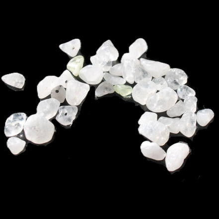 Clear Quartz 35 tiny drilled beads in bright sunlight - Rocks and Things Store