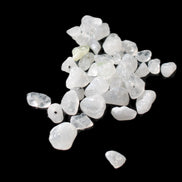 Clear Quartz 35 tiny drilled beads in bright sunlight - Rocks and Things Store