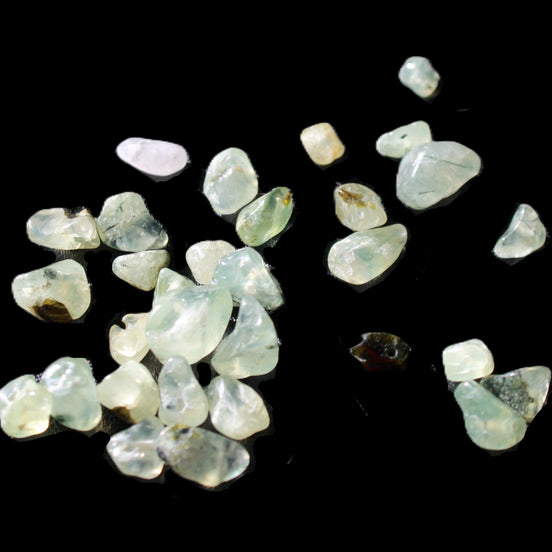 Prehnite 32 tiny drilled beads in bright sunshine - Rocks and Things Store