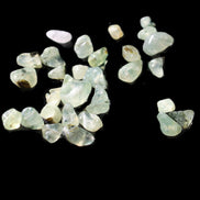 Prehnite 32 tiny drilled beads in bright sunshine - Rocks and Things Store