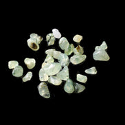 Prehnite 32 tiny drilled beads in bright sunshine - Rocks and Things Store