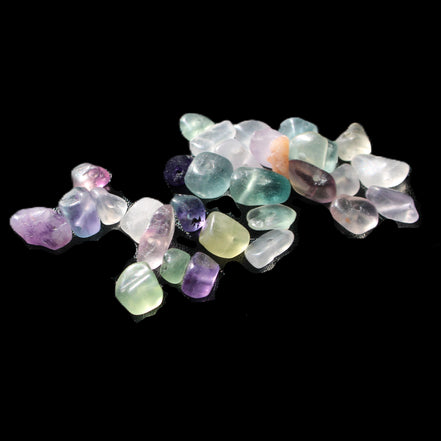 Fluorite 32 tiny drilled beads in bright sunlight - Rocks and Things Store