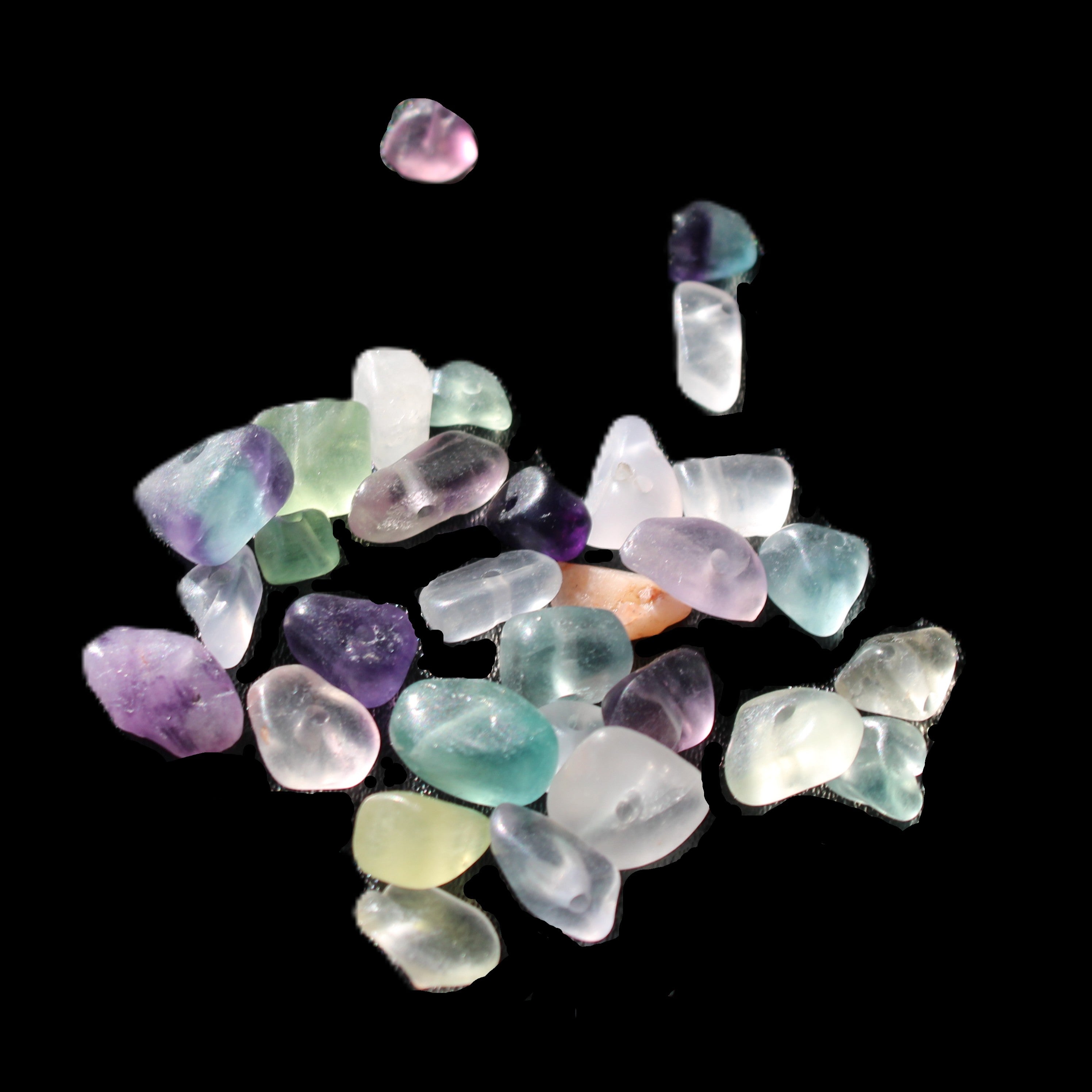 Fluorite 32 tiny drilled beads in bright sunlight - Rocks and Things Store