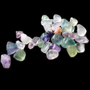 Fluorite 32 tiny drilled beads in bright sunlight - Rocks and Things Store