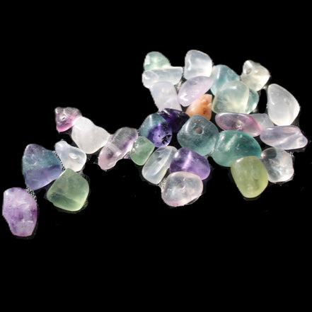 Fluorite 32 tiny drilled beads in bright sunlight - Rocks and Things Store