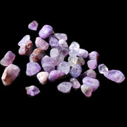 Amethyst 35 tiny drilled beads in bright sunlight - Rocks and Things Store