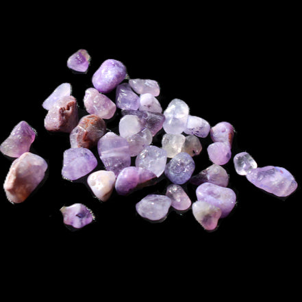 Amethyst 35 tiny drilled beads in bright sunlight - Rocks and Things Store