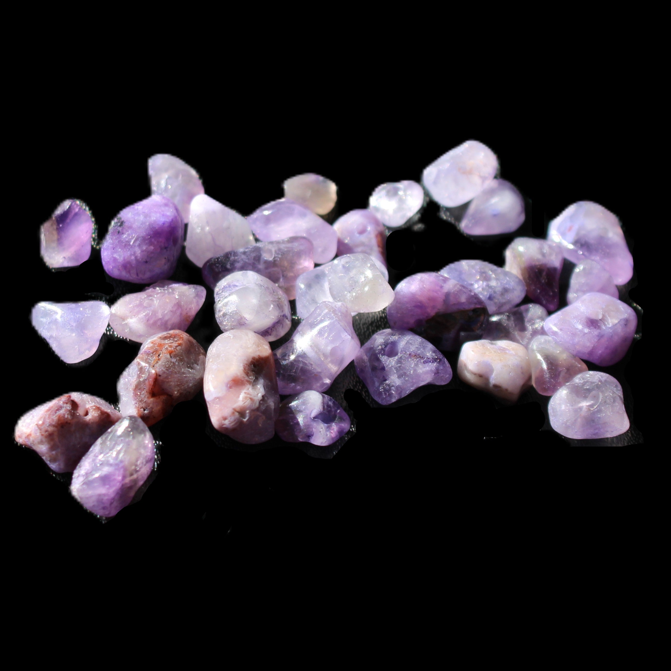 Amethyst 35 tiny drilled beads in bright sunlight - Rocks and Things Store