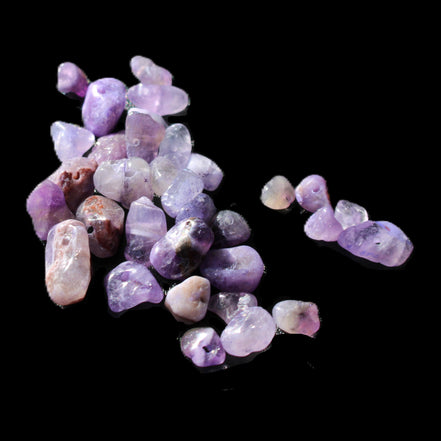 Amethyst 35 tiny drilled beads in bright sunlight - Rocks and Things Store