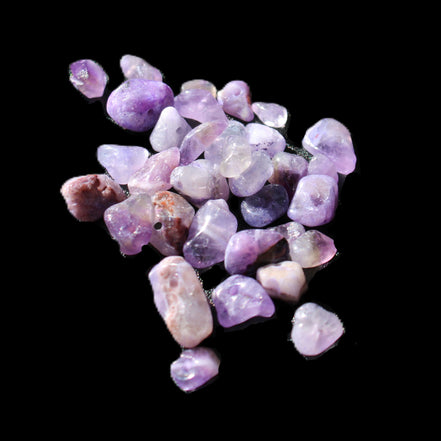 Amethyst 35 tiny drilled beads in bright sunlight - Rocks and Things Store