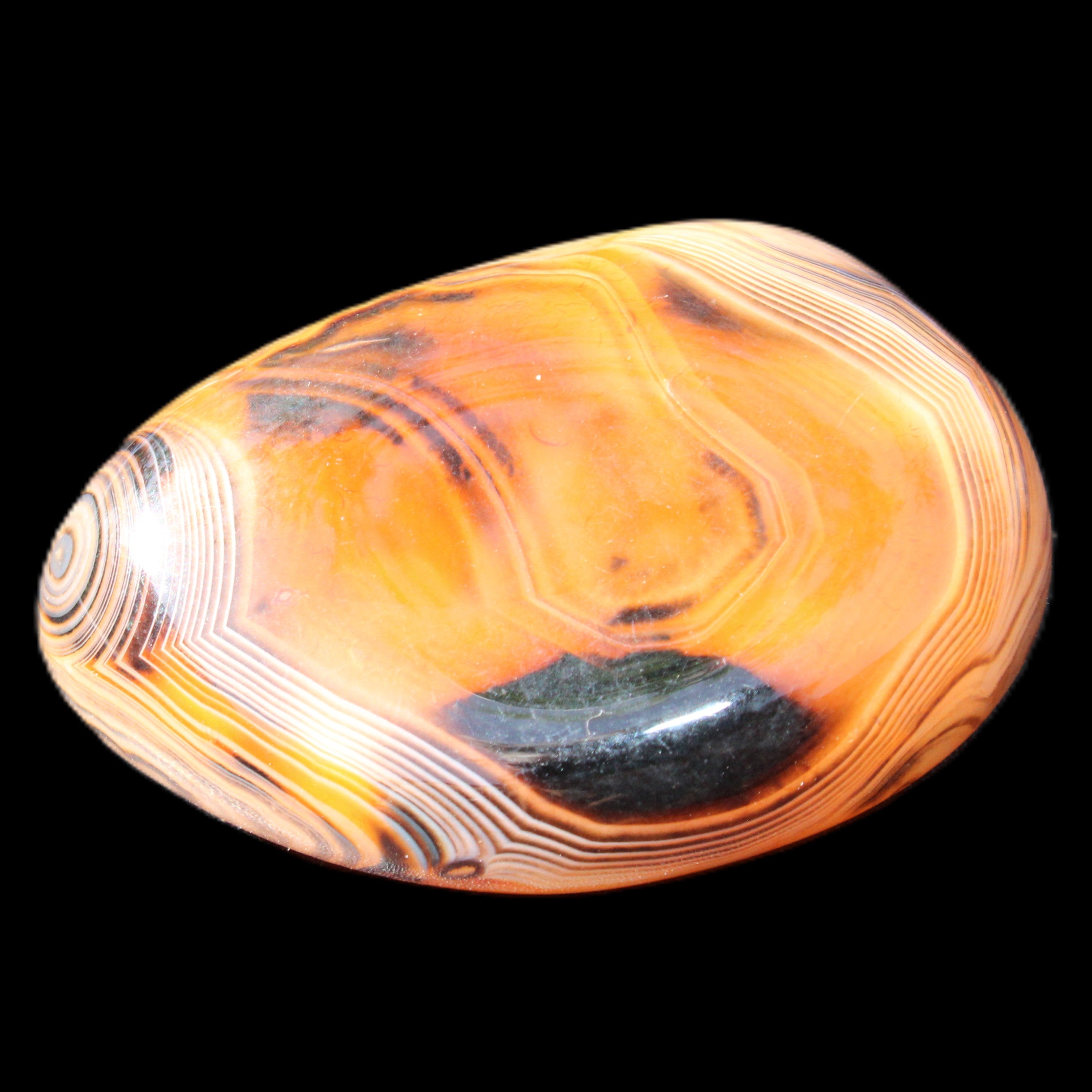 Crazy Lace Silk Banded Agate tumbled stone from Madagascar 39g in sunlight - Rocks and Things Store