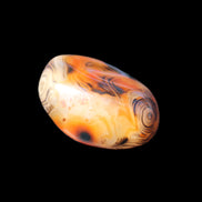 Crazy Lace Silk Banded Agate tumbled stone from Madagascar 39g in sunlight - Rocks and Things Store