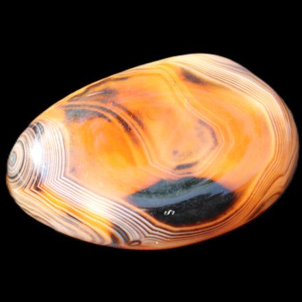 Crazy Lace Silk Banded Agate tumbled stone from Madagascar 39g in sunlight - Rocks and Things Store