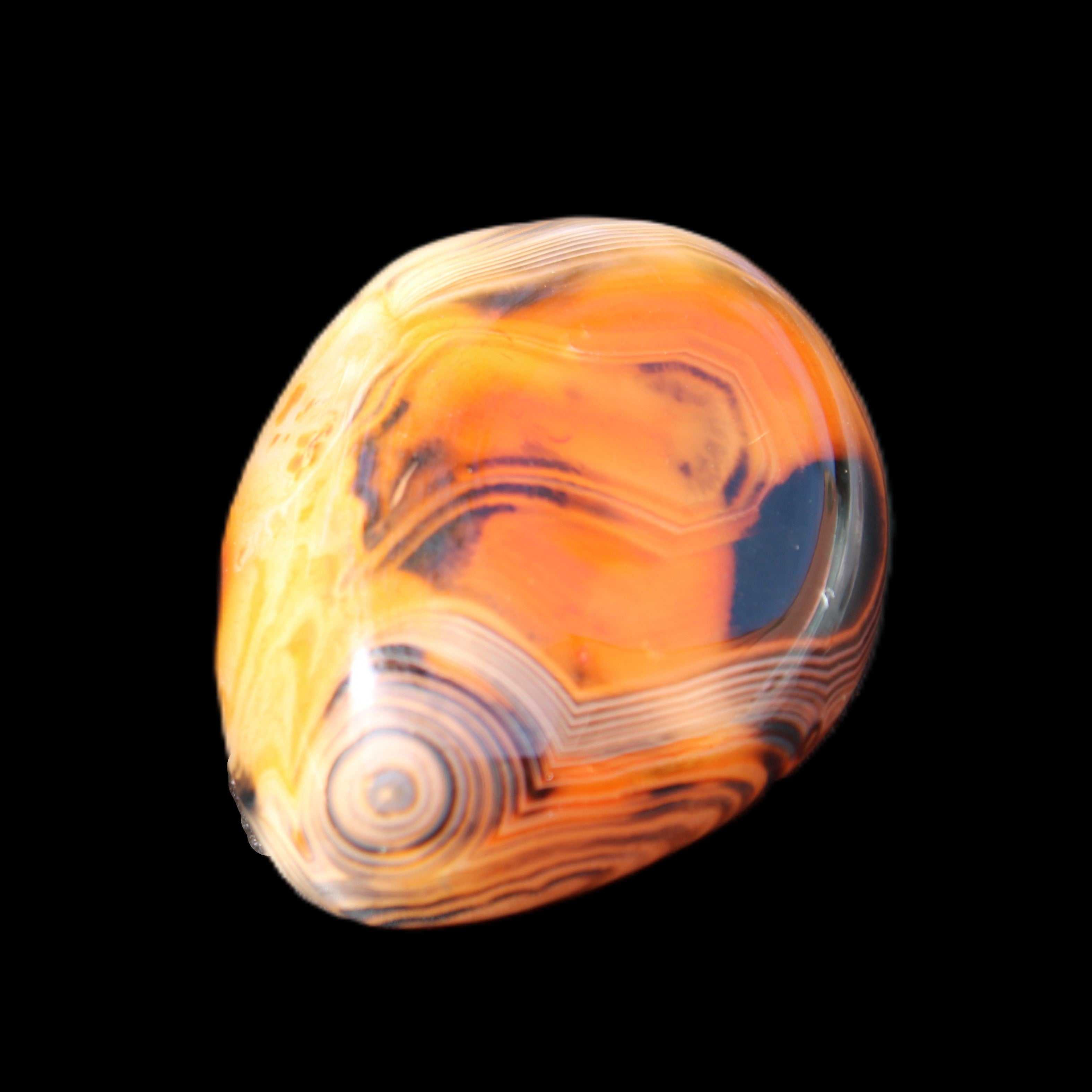 Crazy Lace Silk Banded Agate tumbled stone from Madagascar 39g in sunlight - Rocks and Things Store