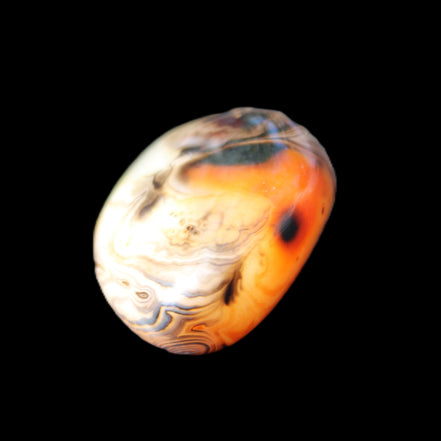 Crazy Lace Silk Banded Agate tumbled stone from Madagascar 39g in sunlight - Rocks and Things Store