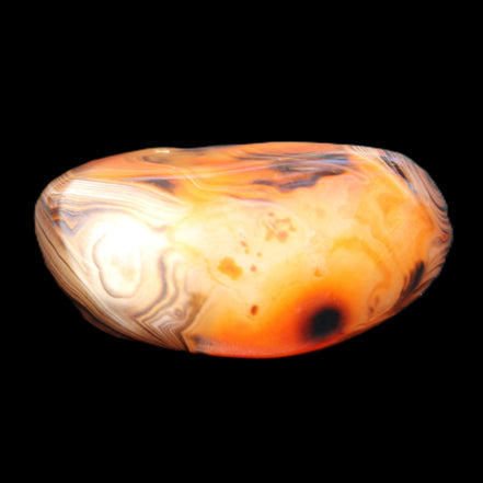 Crazy Lace Silk Banded Agate tumbled stone from Madagascar 39g in sunlight - Rocks and Things Store