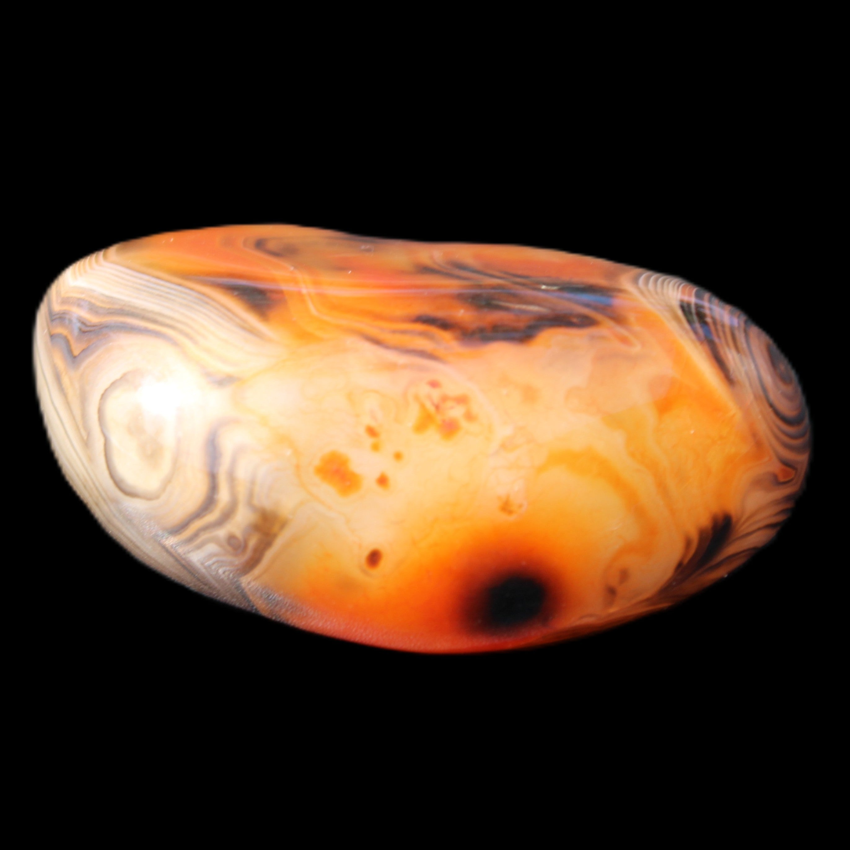 Crazy Lace Silk Banded Agate tumbled stone from Madagascar 39g in sunlight - Rocks and Things Store