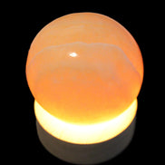 Round wooden 6 LED light base warm white 60mm USB with switch 56g in sunlight - Rocks and Things Store