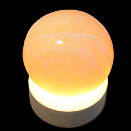 Round wooden 6 LED light base warm white 60mm USB with switch 56g in sunlight - Rocks and Things Store