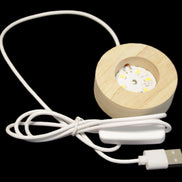 Round wooden 6 LED light base warm white 60mm USB with switch 56g in sunlight - Rocks and Things Store