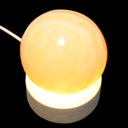 Round wooden 6 LED light base warm white 60mm USB with switch 56g in sunlight - Rocks and Things Store