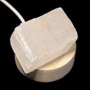 Round wooden 6 LED light base warm white 60mm USB with switch 56g in sunlight - Rocks and Things Store