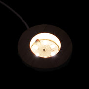 Round wooden 6 LED light base warm white 60mm USB with switch 56g in sunlight - Rocks and Things Store