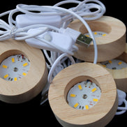 Round wooden 6 LED light base warm white 60mm USB with switch 56g in sunlight - Rocks and Things Store