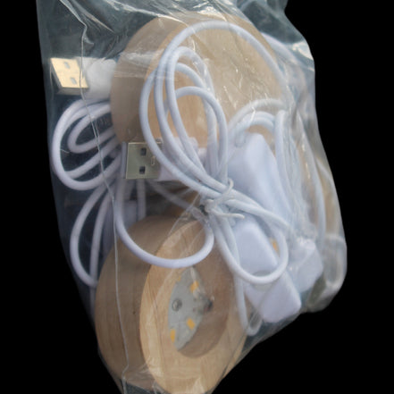 Round wooden 6 LED light base warm white 60mm USB with switch 56g in sunlight - Rocks and Things Store