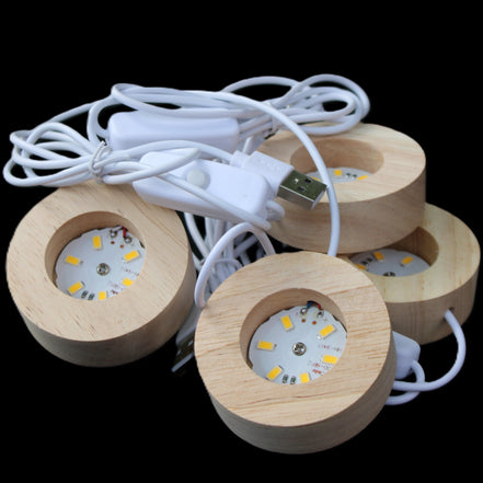 Round wooden 6 LED light base warm white 60mm USB with switch 56g in sunlight - Rocks and Things Store