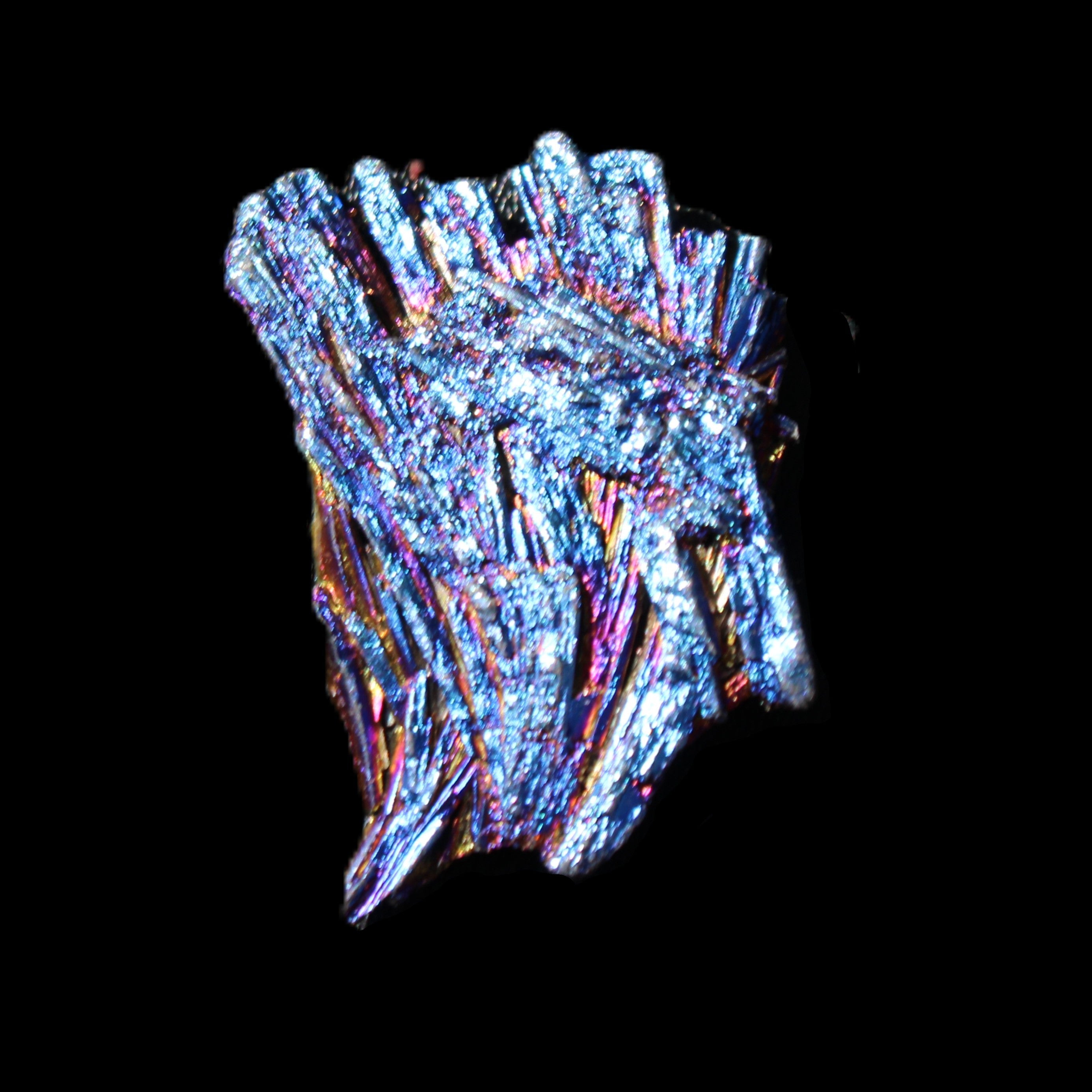 Titanium electroplated Tourmaline feather crystal 5.7g in sunlight - Rocks and Things Store