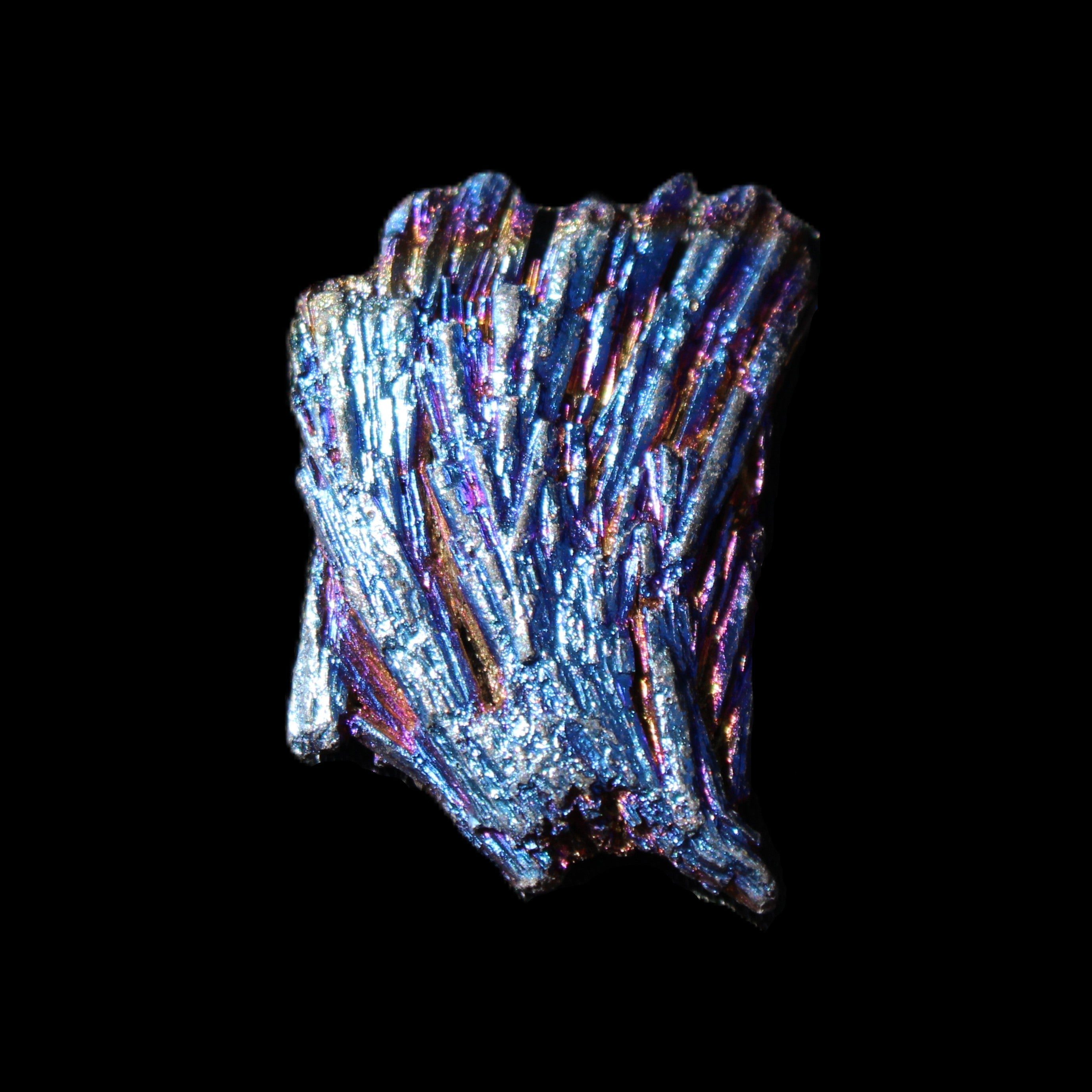 Titanium electroplated Tourmaline feather crystal 5.7g in sunlight - Rocks and Things Store