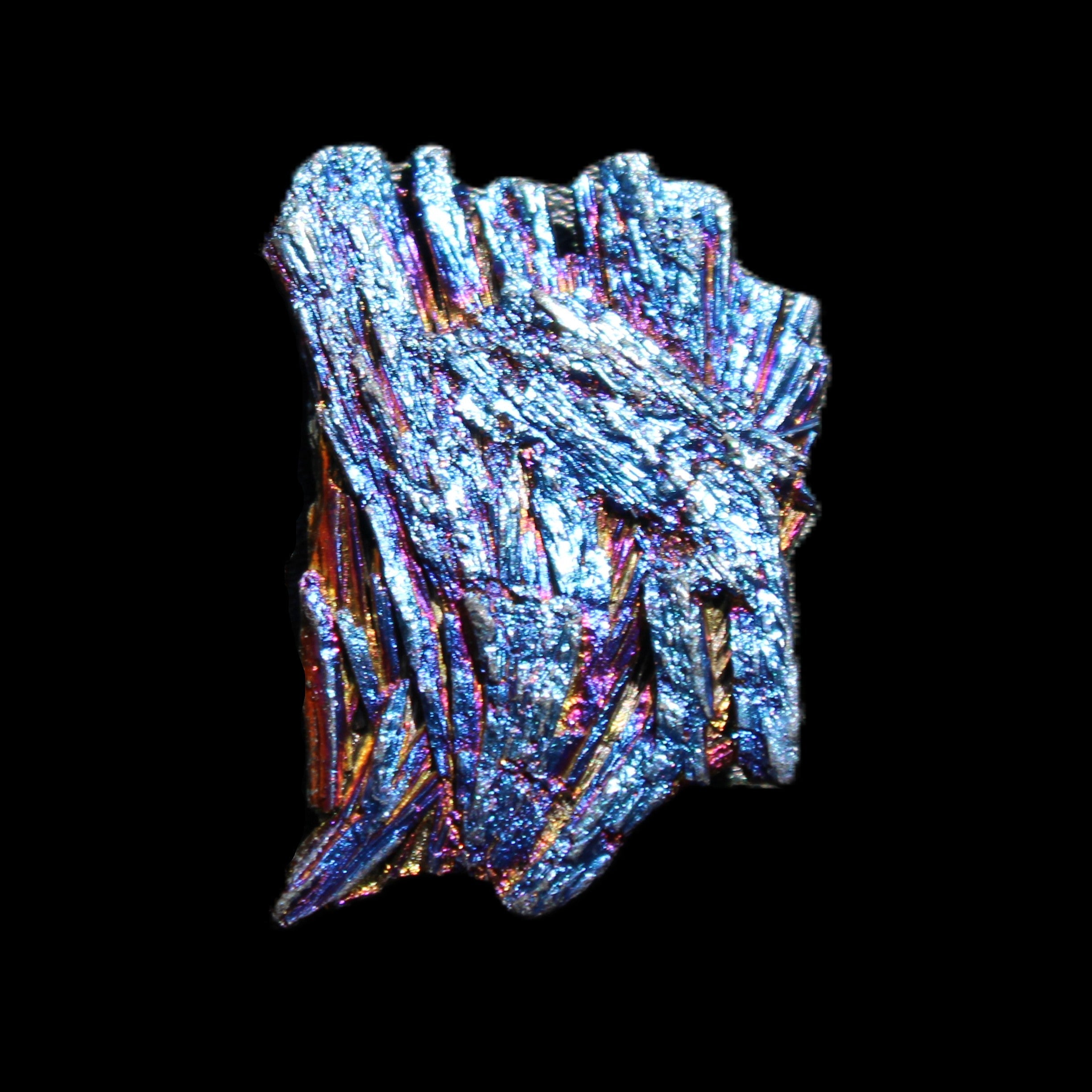 Titanium electroplated Tourmaline feather crystal 5.7g in sunlight - Rocks and Things Store