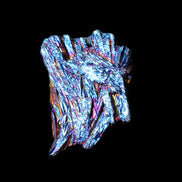 Titanium electroplated Tourmaline feather crystal 5.7g in sunlight - Rocks and Things Store